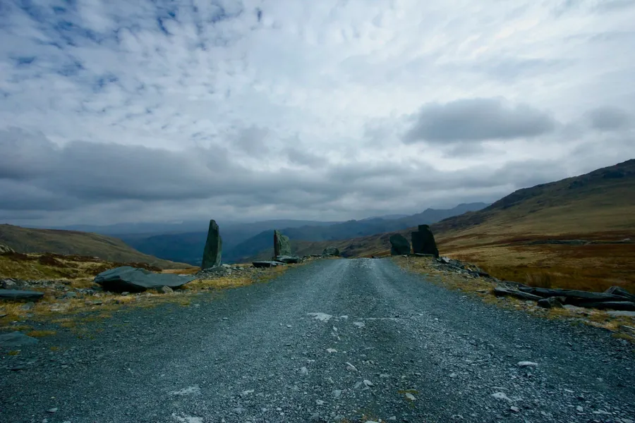 Slate waste and standing stones beside the road at Honister Pass in the Lake District, one of the sources of Westmorland green slate