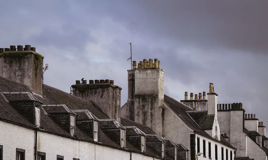 Slate roofs and dormers on a border-country terrace of the type built with sarking boards beneath the covering