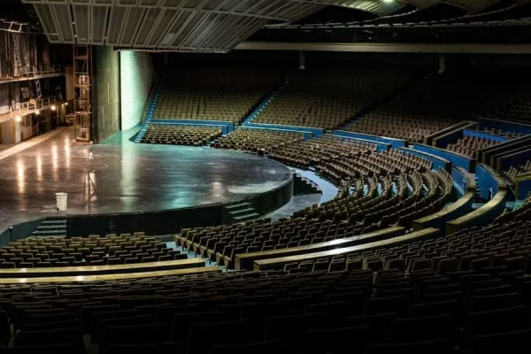 An auditorium and stage awaiting a performance, the kind of space the Brewery Arts Centre offers Kendal