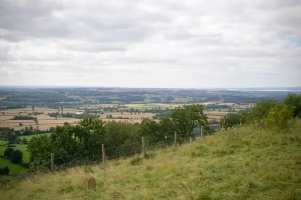 View over Eden Valley farmland from a hilltop, the reward for the walk up to Penrith Beacon
