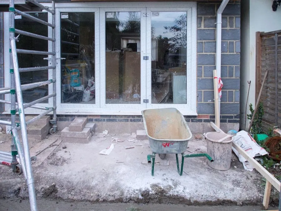 Scaffolding erected around a house undergoing roof renovation in Carlisle