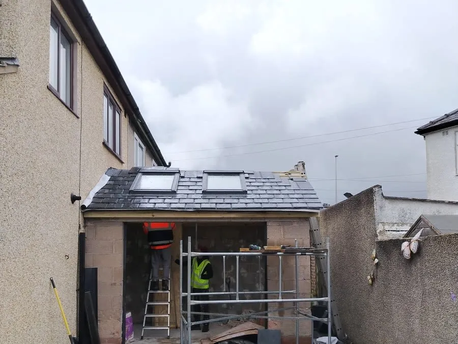New tiled roof with two roof windows fitted to a rear extension in Carlisle