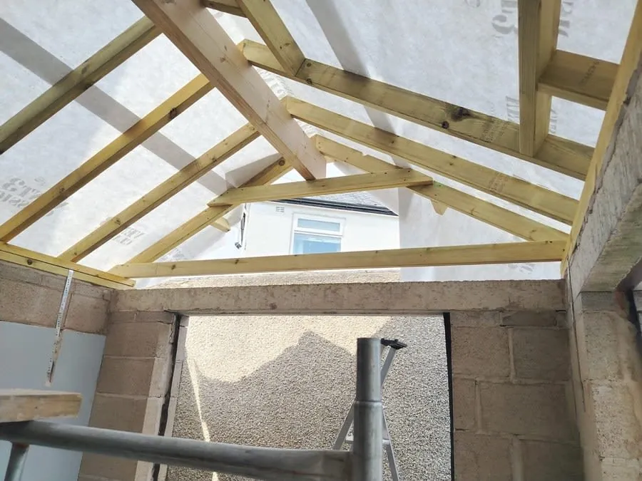 New roof rafters and breathable membrane in place before the covering is laid, on a project in Carlisle